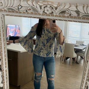 Boutique off the shoulder top with bell sleeves